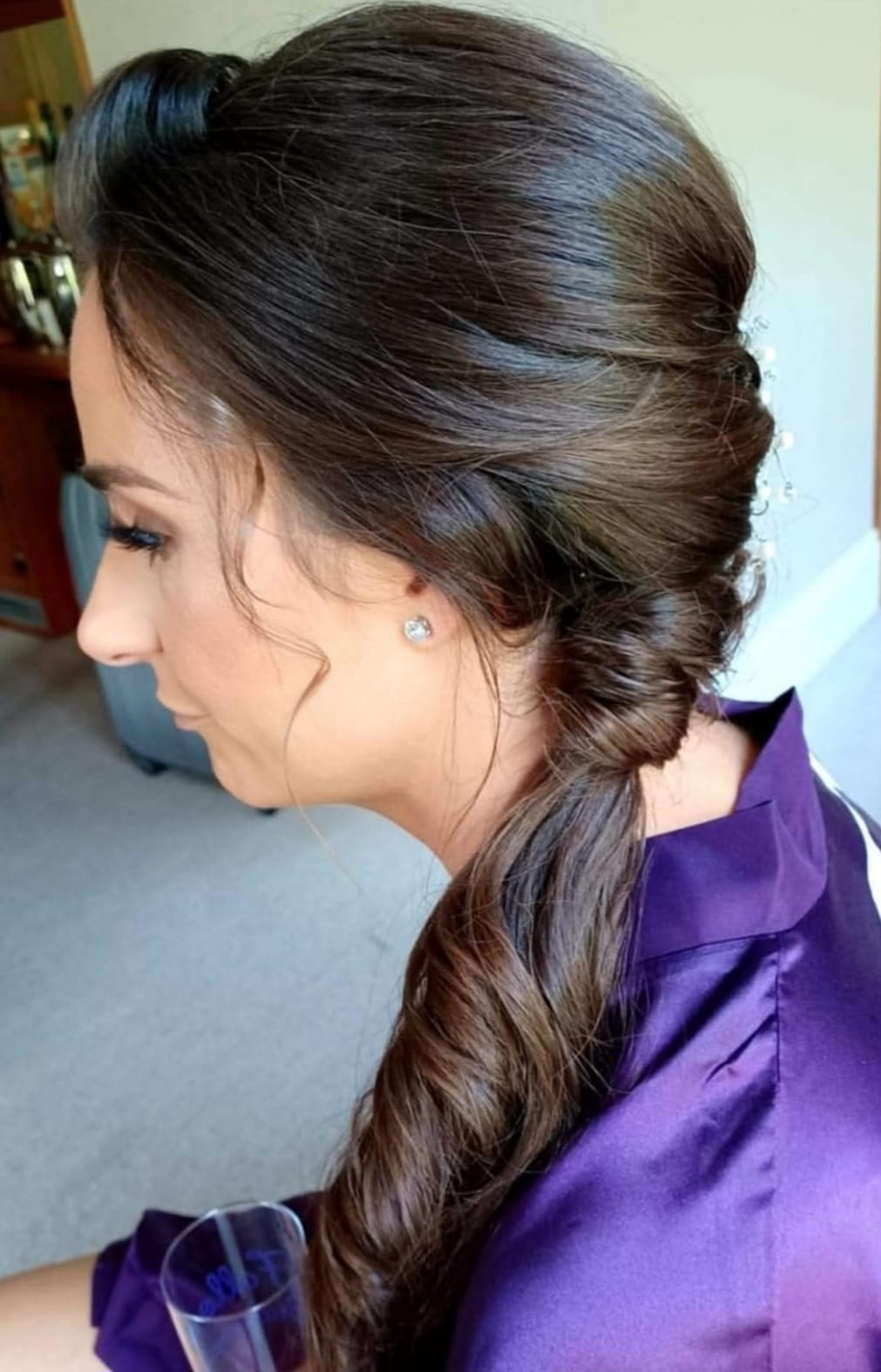 Braided Side Ponytail - Professional hair styling in Barnsley Braided Side Ponytail - Sophisticated side-swept braided style at Stella's Hair & Beauty Salon Barnsley