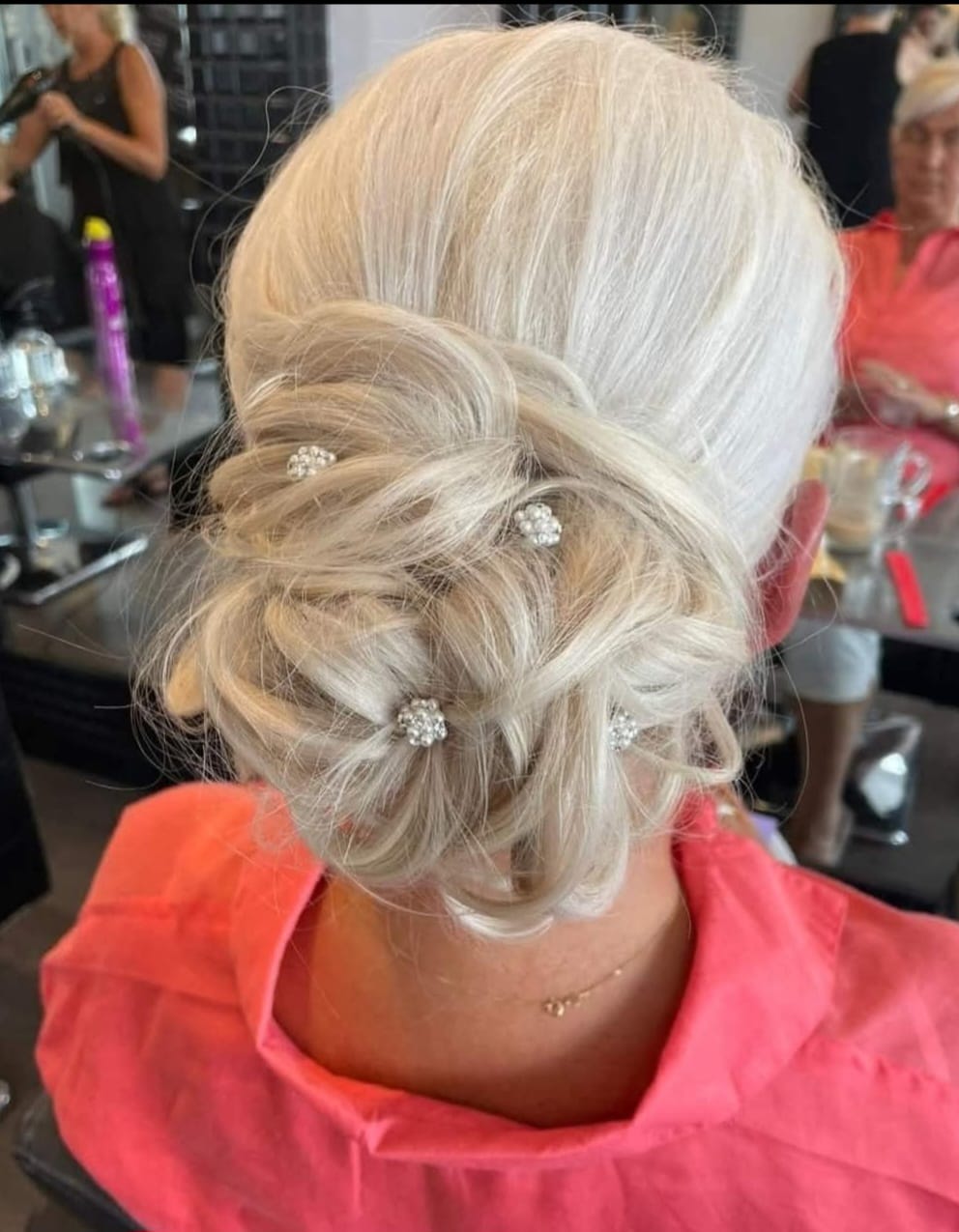 Crystal Pin Updo - Professional hair styling in Barnsley Crystal Pin Updo - Low updo with scattered crystal hair pins at Stella's Hair & Beauty Salon Barnsley