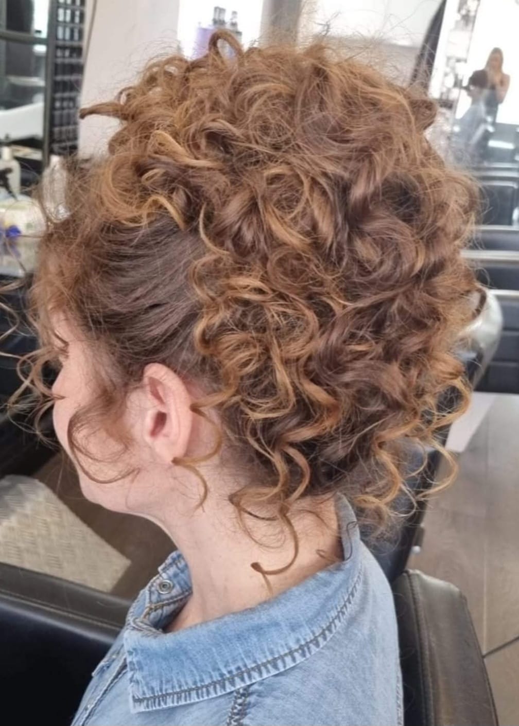 Voluminous Curly Updo - Professional hair styling in Barnsley Voluminous Curly Updo - Textured and romantic curly updo at Stella's Hair & Beauty Salon Barnsley