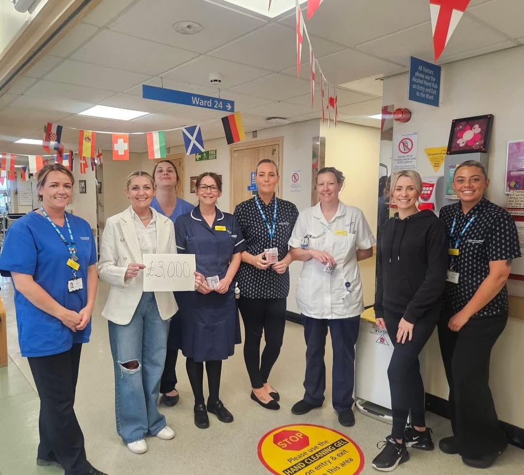 Stella's team presenting £3,000 donation to Barnsley Hospital staff